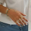 Bracelet de Doigt Bohème Doré – Pompon Turquoise – Image 3